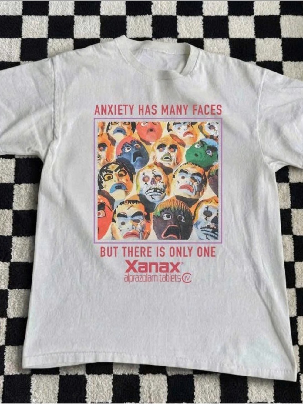 White Tee with Multicolor Face Graphic and Pink Text